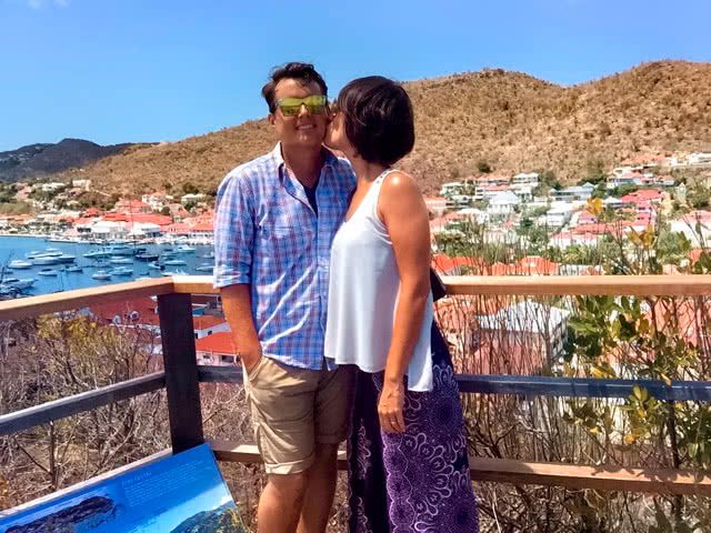 Maria gives Neil a smooch while looking out over Gustavia